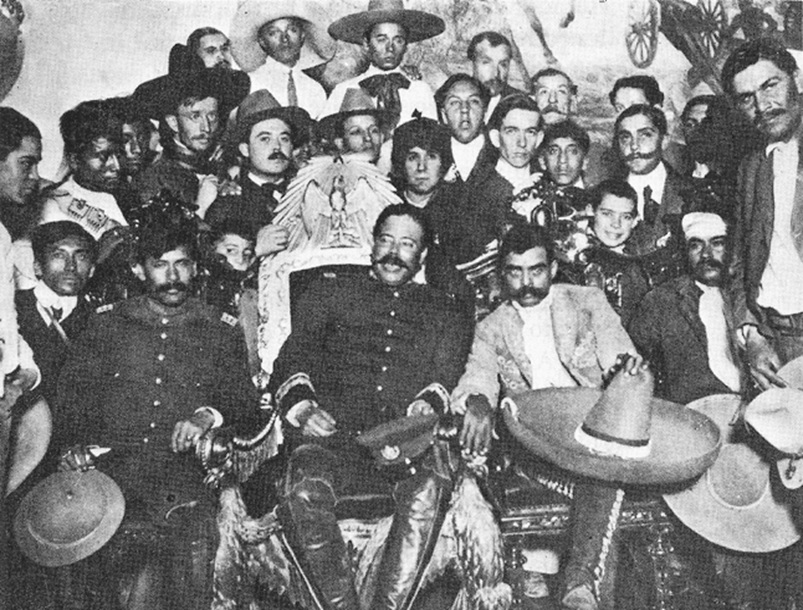 1914  Dec   Mexico d.f.  (distrito federal), capital of Mexico                              Francisco Villa and Emiiano Zapata in the presidential chair..jpg